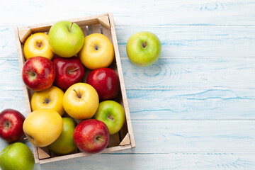 Wall Mural - Colorful ripe apple fruits in box
