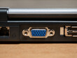© Tomasz - Simple laptop computer VGA video output connector, monitor connection port object macro, detail extreme closeup, frontal shot, nobody. Old legacy video outputs, obsolete dated retro technology concept