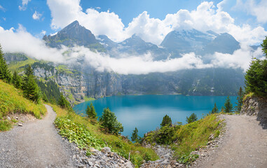 Wall Mural - stunning mountain landscape lake Oeschinensee, bernese alps hiking trail switzerland