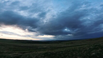 Sticker - walking on a green field with stormy blue sky footsteps and birds singing