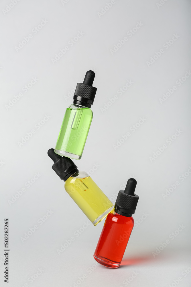 Oils for vape mod on light background