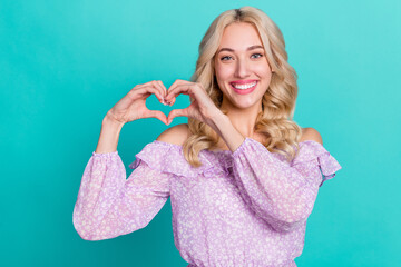 Wall Mural - Photo of dreamy cute lady wear violet blouse showing arms heart isolated turquoise color background