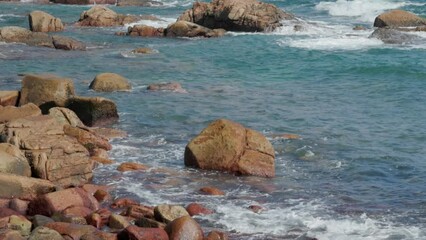 Sticker - Slow motion of sea splash over the rock