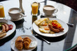 Delicious Breakfast for Two at the Luxury Hotel, Eggs, Sausages, Vegetables, Croissants Coffee, Orange Juice
