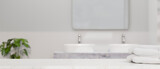 Fototapeta Kawa jest smaczna - Modern white bathroom countertop with towels and copy space