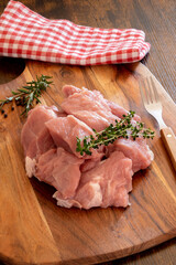 Wall Mural - top view of piece of raw veal on wooden board