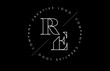 Outline RE r e letter logo with cut and intersected design and  round frame on a black background.