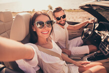 Self-portrait Of Attractive Cheerful Couple Riding Car Spending Free Time Weekend Fresh Air Relax Outdoors