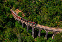 Aerial View Of A Train Crossing The Nine Arch Bridge In Badulla, Sri Lanka.