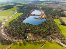 Aerial View Of Fens And Small Coniferous Forest In Nature Area Brugven With Road, Valkenswaard, Noord-Brabant, Netherlands.
