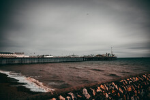 Cloudy Gloomy Sky Over The Brighton Pier, UK In The Evening