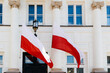 State red and white flag of Poland on the facade of a government building
