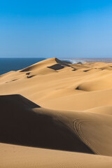 Wall Mural - Namibia, the Namib desert, falling into the sea