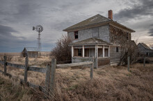 Old Abandoned Farmhouse In A Rural Area In Alberta, Canada