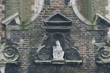 Closeup Photo Of Virgin Mary's Sculpture On The Facade Of Kerzenkapelle Kevelaer Germany