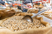 White Beans In A Sack With A Shovel At A Vegetable Stall In The Market. Close Up Shot.
