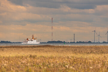 Sticker - Beautiful view of a beach and sailing ship in Langeoog, Northern Germany