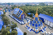 Aerial view of Wat Rong Suea Ten, the Blue Temple, in Chiang Rai, Thailand