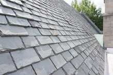 Slate Roofing Tiles On A Historic Building. Slate Roofs Are Attractive, Durable, And Require Specialized Installation Methods. 