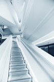 Fototapeta Przestrzenne - Interior view of empty futuristic stairway. Building abstract background