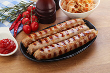 Grilled Sausages With Cabbage And Sauce