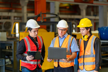 Team of diversity worker inspecting inside the steel manufacturing factory while listening to senior manager advice on improvement of capacity and productivity concept