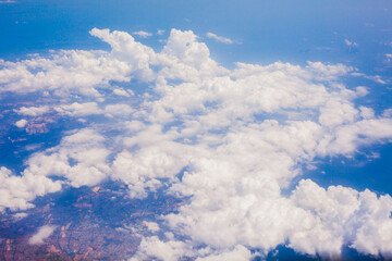 Wall Mural - top view from fly, aerial view of clouds and sky