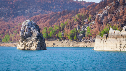 Stone cliffs at Oymapinar Dam in Green Canyon in Turkey