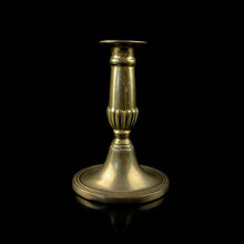 Copper Antique Candlestick With Burning Candles. Vintage Golden Candlestick On Black Isolated Background