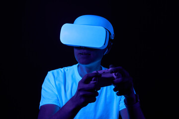 Wall Mural - man with virtual reality headset is playing game.