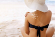 Leinwandbild Motiv Suncream. Suntan Lotion Beautiful Woman Applying on beautiful on Shoulder. Sunscreen Solar Cream. Skin care. Sun protection