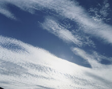Wispy Clouds In The Sky