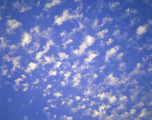 Wispy Clouds In The Sky