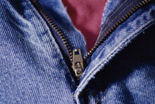 Close-up Of A Zipper On A Pair Of Jeans
