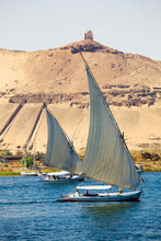 Egypt, Aswan, Two Feluccas Sail Up Nile River