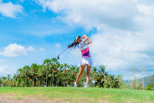 Lifestyle. Girl Playing Golf Game On Green Grass.