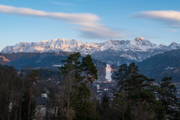 Wall Mural - Landscape with view of Garmisch-Partenkirchen at sunset