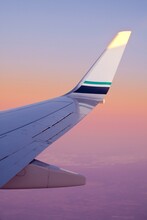 Passenger Jet Wing At Sunset
