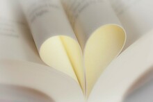 Pages In Book Folded To Form Heart