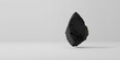 © Vladislav - black or dark stone or rock fragment isolated on white background. Layout or wallpaper. 3d rendering