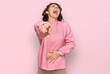 © Krakenimages.com - Young hispanic woman wearing casual clothes laughing at you, pointing finger to the camera with hand over body, shame expression
