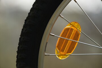 Wall Mural - Cycling and bicycle safety, reflective light on the bike.