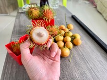 Fresh Rambutan Sweet Tropical Fruit And Wooden Background Harvest From The Garden, 4 May 2022 , Buriram Province.