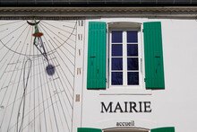Town Hall Facade In France With French Text Mairie With Solar Clock On Wall