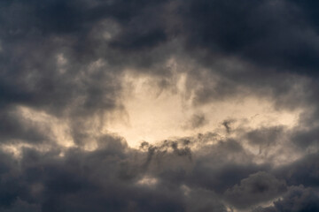 Poster - Dark gloomy clouds on a stormy sky. Natural atmospheric background.