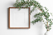 © nikavera - Square frame mockup in white room interior with fresh eucalyptus plant in vase