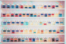 Group Of Color Glass Cosmetic Bottles. Painting Effect.