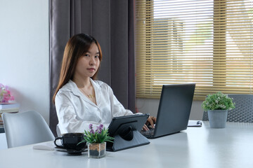 Poster - Woman is using a computer laptop. Online live chat chatting on an application communication website and social network, Using a smartphone