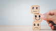 © U-STUDIOGRAPHY DD59  - Customer services best excellent business rating experience. Satisfaction survey concept.Chooses a smile face on wood block cube.