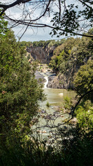 Wall Mural - Small waterfall of the Flora river ne small Pellicone lake, Lazio, Italy